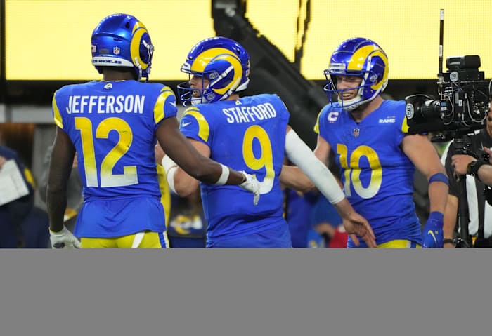 Jan 30, 2022; Inglewood, California, USA; Los Angeles Rams wide receiver Cooper Kupp (10) celebrates with teammates Matthew Stafford (9) and Van Jefferson (12) after a touchdown against the San Francisco 49ers in the fourth quarter during the NFC Championship Game at SoFi Stadium. Mandatory Credit: Kirby Lee-USA TODAY Sports